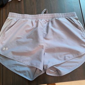 Under Armour running shorts WITH POCKETS